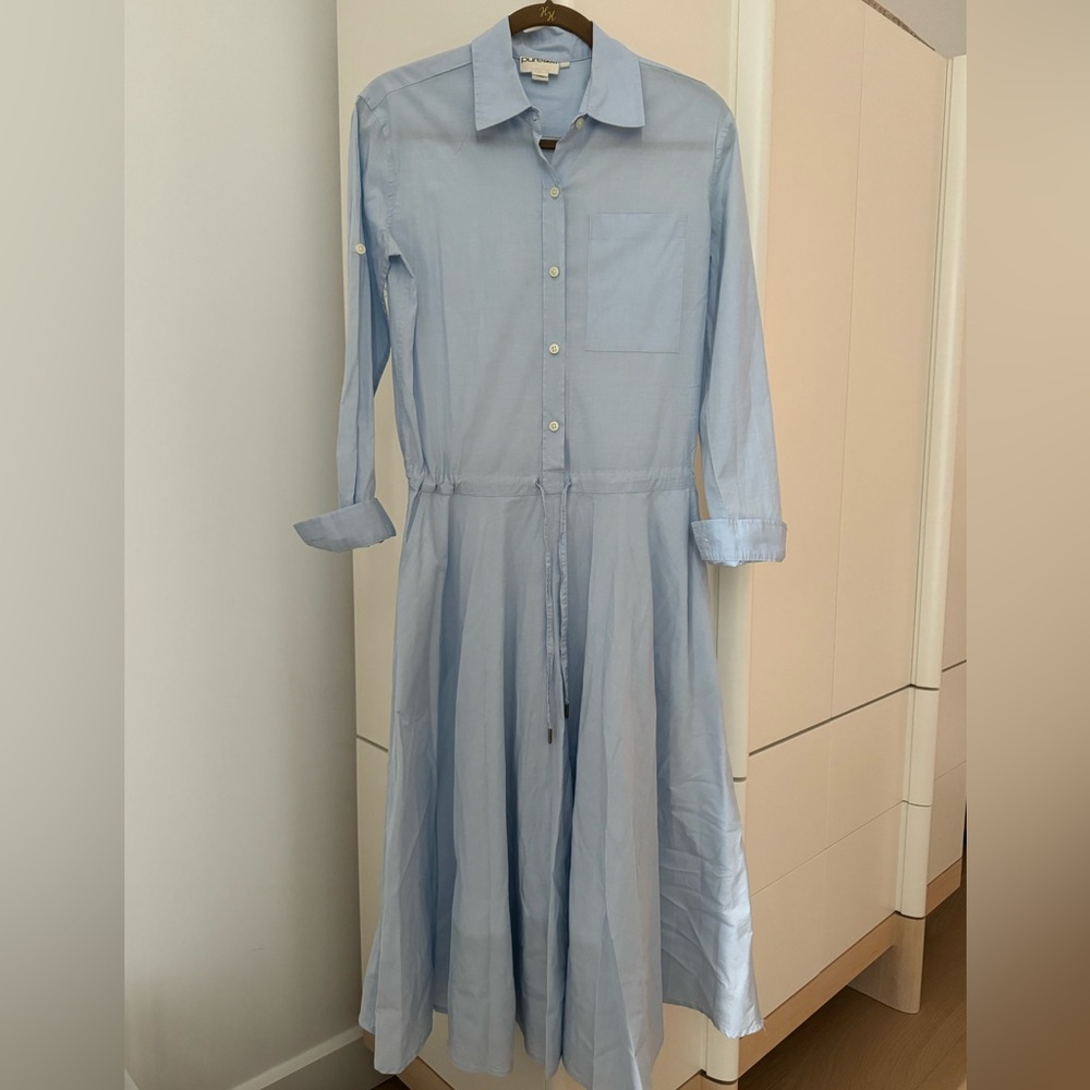 Pure DKNY Light Blue Midi Dress with long sleeve. SizeXP